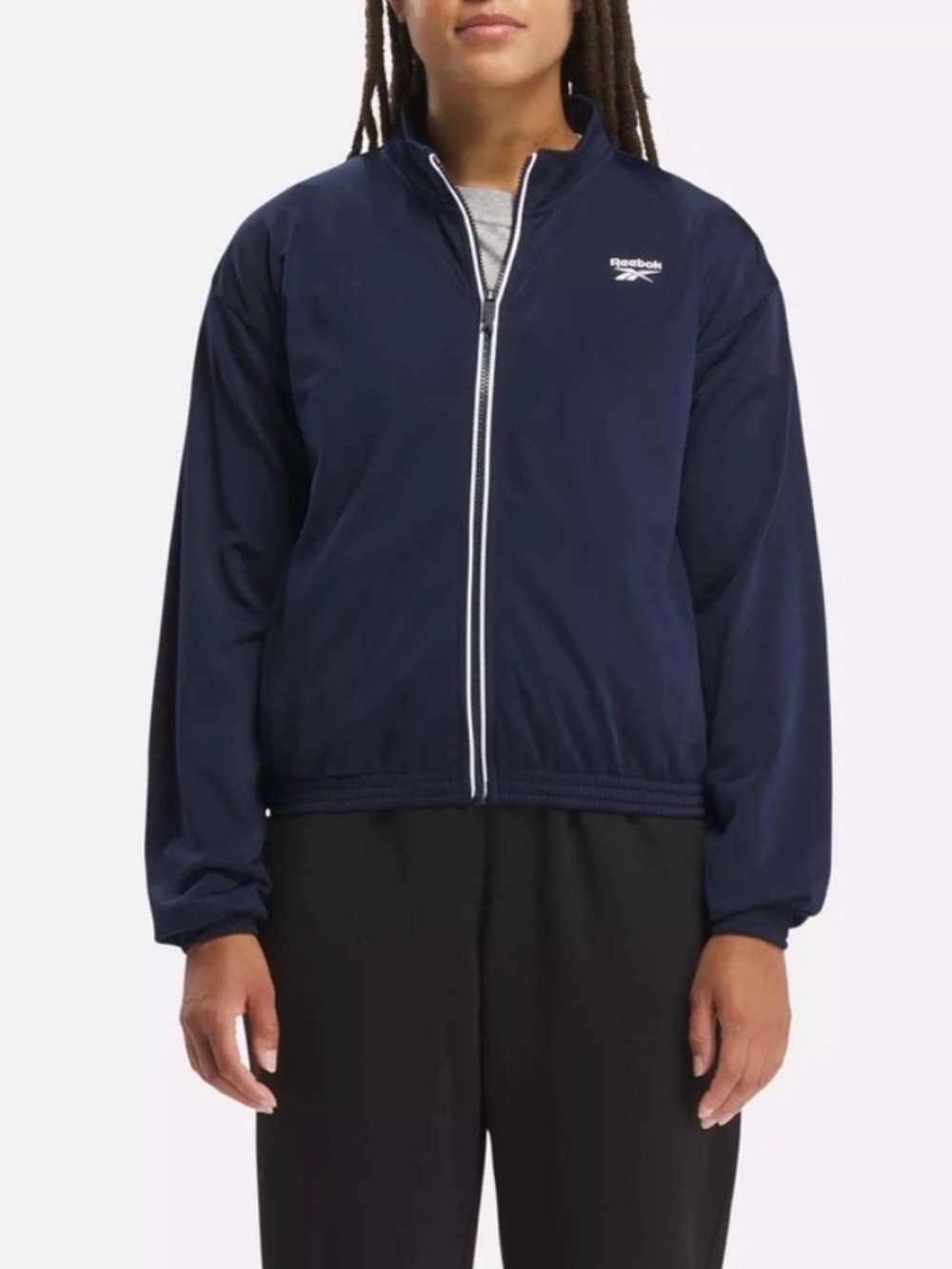 Reebok Women's Identity Back
Vector Tricot Track Zip up Jacket. Navy/White.